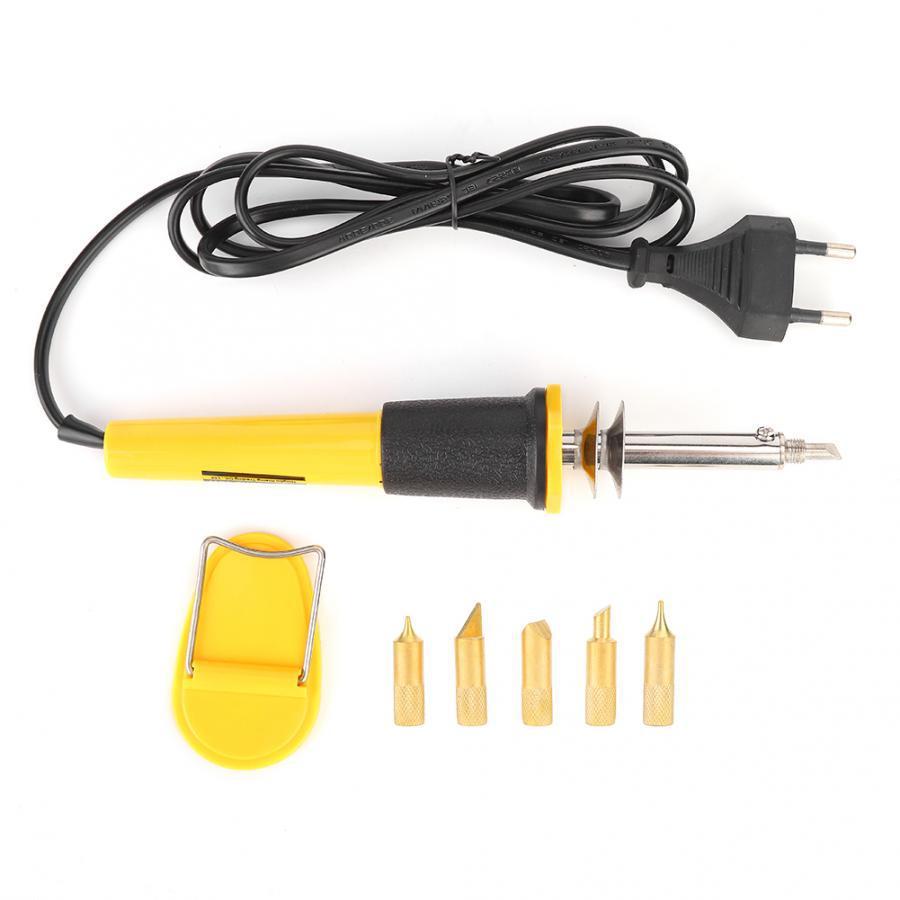 Multifunctional set: soldering iron, brass brush and tools for leather and wood