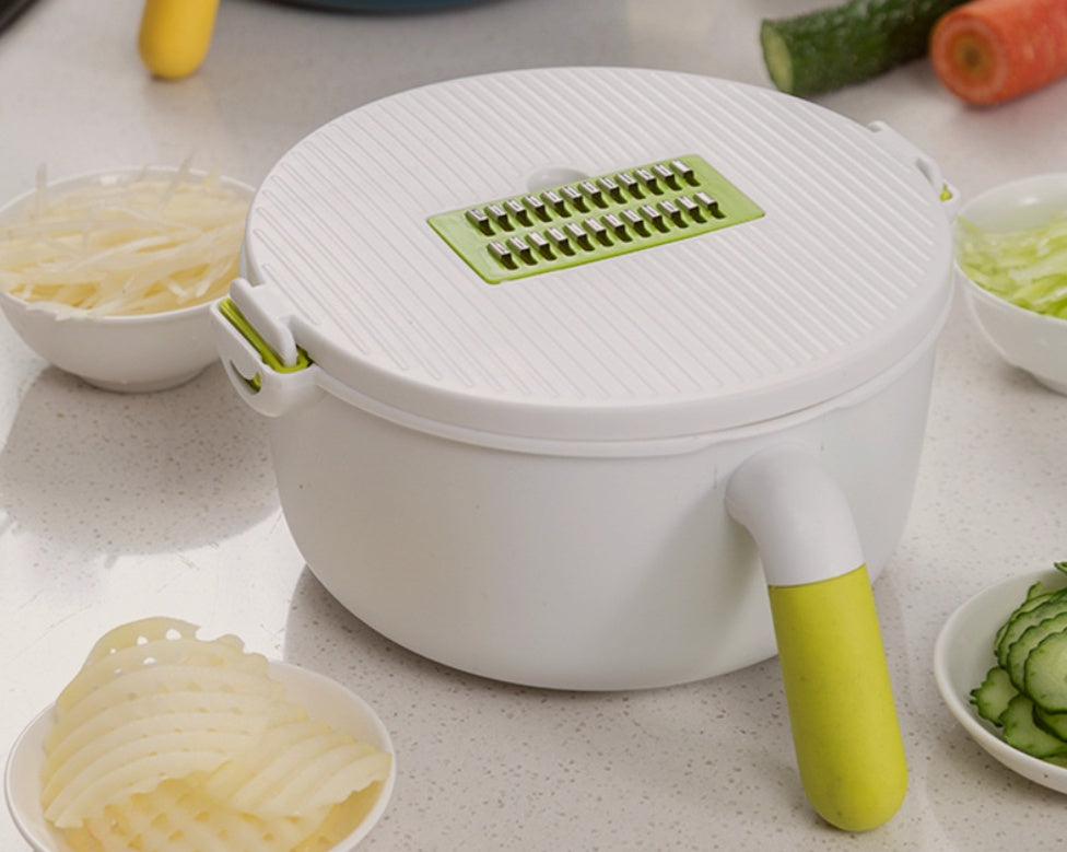 Multifunctional vegetable cutter with drain basket