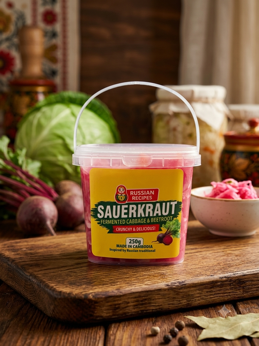 Container of sauerkraut with a rustic background featuring vegetables and jars.