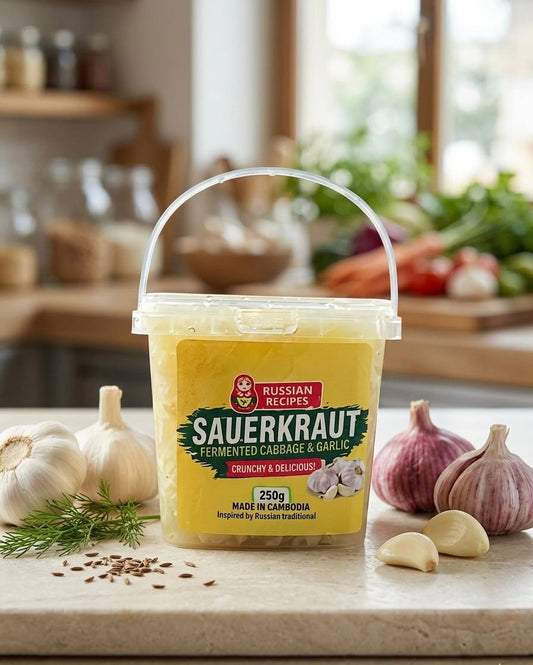 Container of Russian Recipes Sauerkraut with garlic and herbs on a kitchen counter